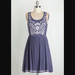 Blue mini dress with white embroidery